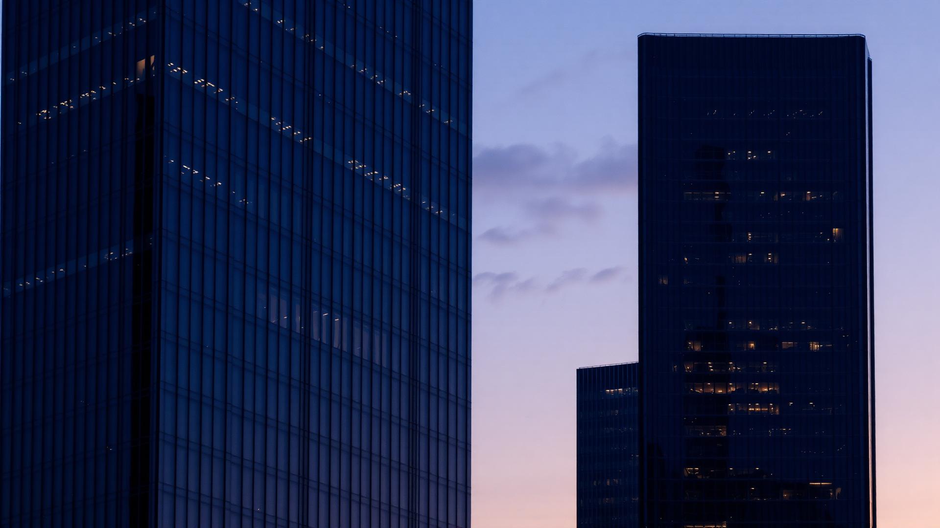 Modern corporate skyline at dusk
